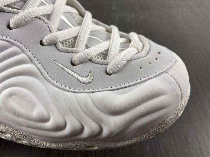 cdg x nike air foamposite one dj7952-100