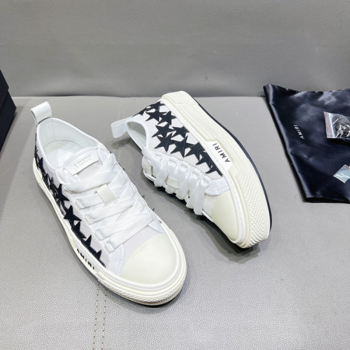 amiri* appliquéd leather and canvas sneakers