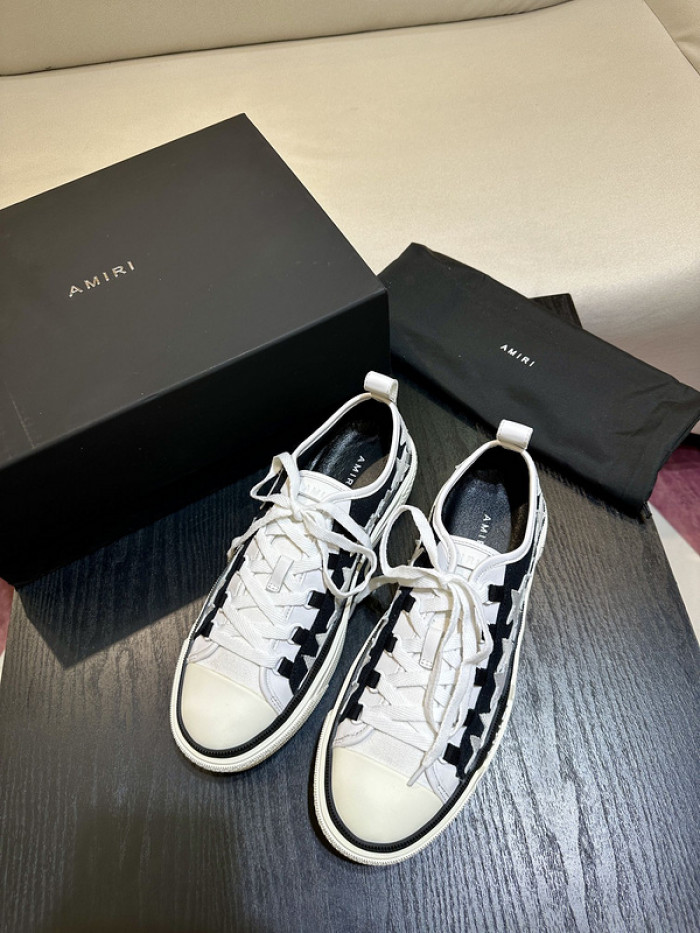 amiri* appliquéd leather and canvas sneakers